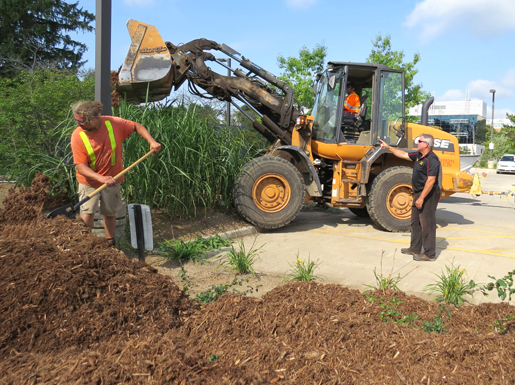 Mulch delivered to create flower beds along Southring Road
